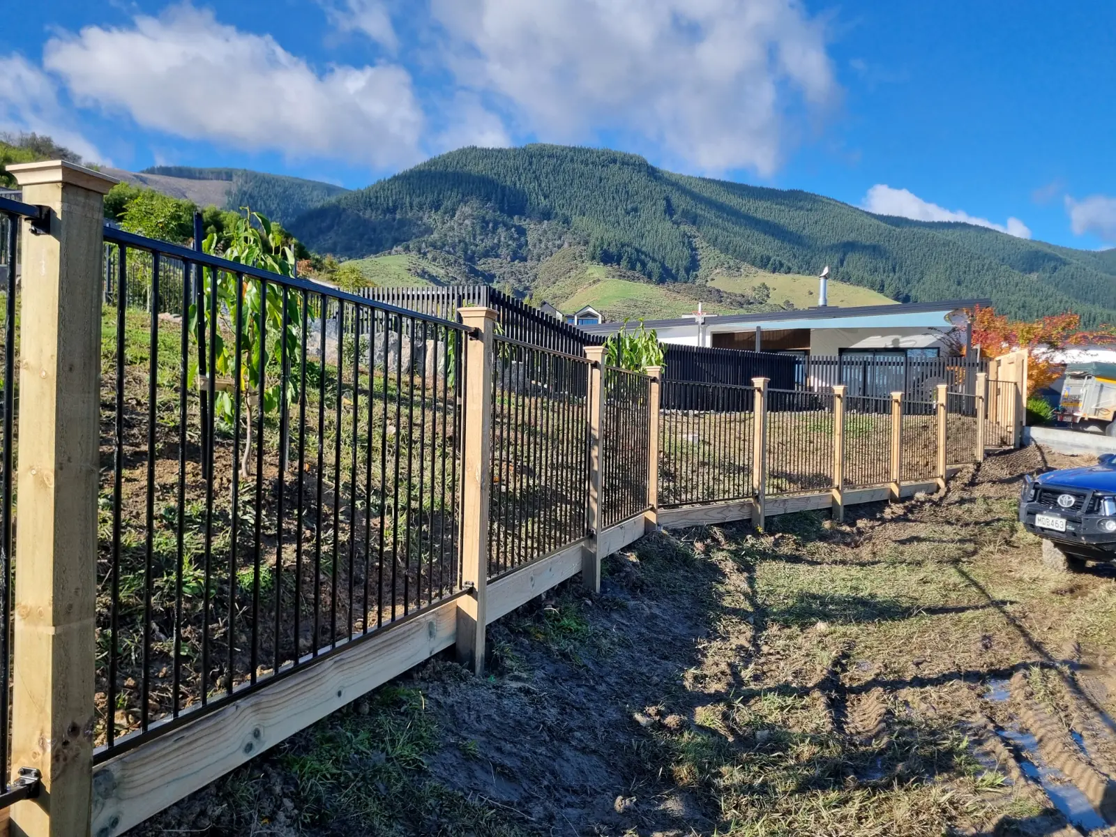 Pool Fencing with Wooden Posts and Caps